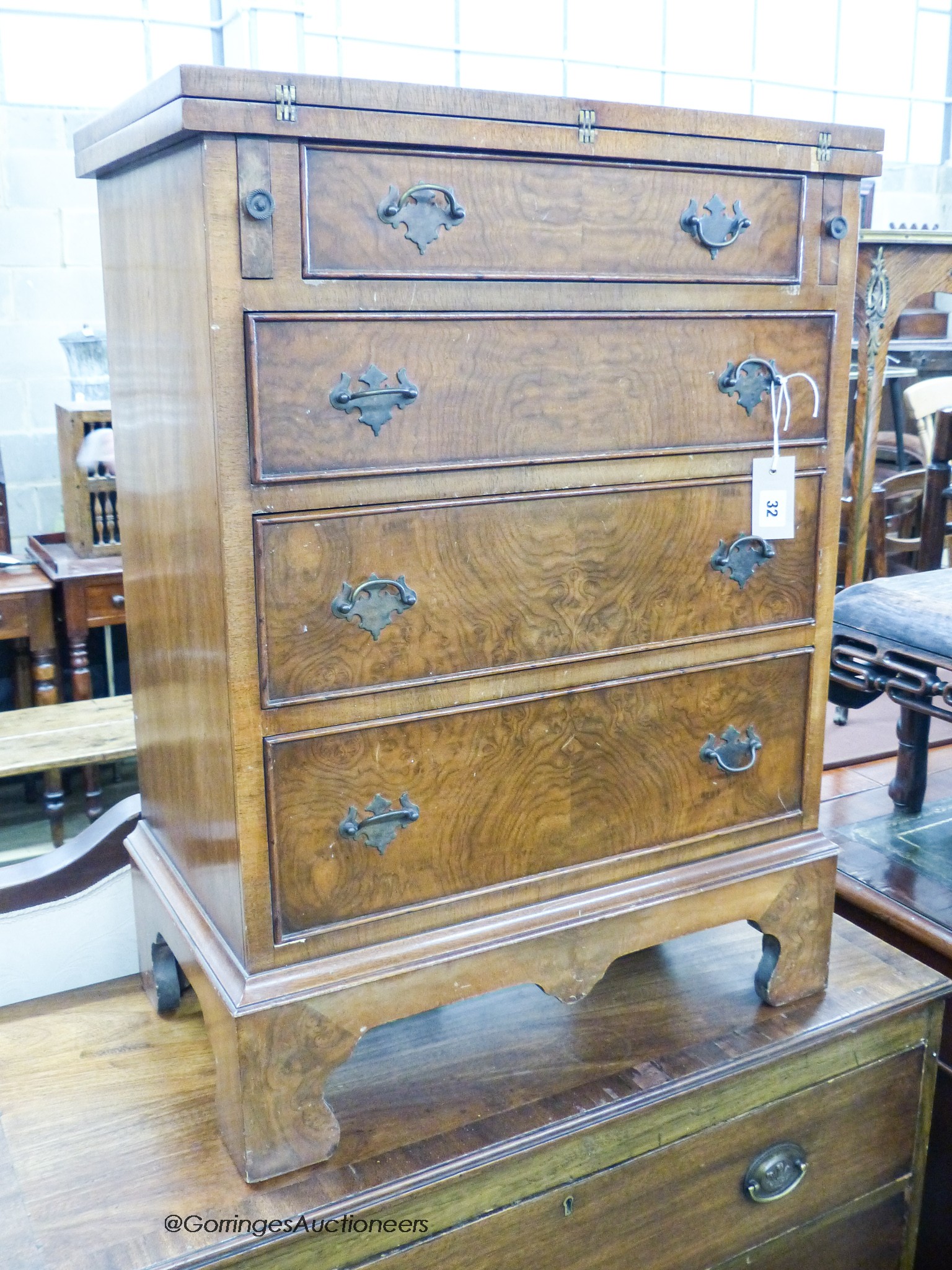 A reproduction George I style walnut bachelor chest, width 59cm, depth 35cm, height 80cm